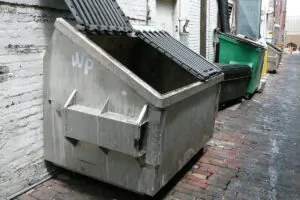 front load dumpsters in an alley